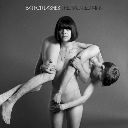 Allmusic album Review : Natasha Khans two previous Bat for Lashes albums -- 2006s Fur and Gold and 2009s Two Suns -- were lavish affairs from their cover images to their intricate songs. However, The Haunted Mans album artwork, which depicts Khan as naked except for the also nude man slung over her shoulders, was one of the first hints that she was taking a slightly different tack with this set of songs. More proof came with "Laura," the soft, spare ballad she picked to be the albums lead single. While Khan explored her flair with character studies on Two Suns, this songs intimacy and the keenly observed details in lyrics like "your tears feel hot on my bedsheets" felt more like a natural progression from songs like "Sad Eyes," off of Fur and Gold. As that album (and Two Suns more restrained moments) showed, Khans singing and writing are more than strong enough to be more or less naked, and she finds freedom in this throughout most of The Haunted Man. Feeling alive is a refrain on many of these songs, most vividly on the proudly sexual "Oh Yeah," where Khan is "waiting like a flower to open wide" and the unearthliness of her upper register adds a fairytale sparkle to her desire. This mix of rawness and delicacy makes her among the best of all the Kate Bush disciples dotting the early 21st century pop landscape at emulating the will-o-the-wisp willfulness of La Bushs work, particularly on the silvery, shivery opening track "Lilies" and "Winter Fields," which soars above the English countryside with just a little bit of fear shading its wonder. When The Haunted Man strays from these sparer sounds, the results are mixed: the tribal/primal rhythms and vocals on "Horses of the Sun" add to its rough-hewn beauty, but the electronic squiggles and processed vocals on "Marilyn" are distracting and indulgent. Still, much of The Haunted Man caters to Khans strengths, and songs such as "All Your Gold," "A Wall," and "Rest Your Head" are among the catchiest shes written in some time. Focus and restraint might not sound exciting in and of themselves, but The Haunted Man is more direct than any of Bat for Lashes previous work, and manages to keep the air of mystique around Khan that has made her one to watch and listen to since her early days. the_haunted_man