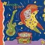 Allmusic album Review : Bonnie Raitts ninth and final album for Warner Bros. Records was a star-crossed affair that began in 1983 in a session with producer Rob Fraboni, and was a typical Raitt mixture of different genres and songwriters, from Jerry Lynn Williams ("Excited") and Eric Kaz ("Angel") to reggae star Toots Hibbert ("True Love Is Hard to Find") in a style similar to her 1982 album Green Light. This record seems to have been rejected by Warner, but three years later Raitt returned to the studio with Bill Payne (Little Feat) and George Massenburg and cut a group of commercial-sounding songs by the likes of Bryan Adams and Tom Snow. Nine Lives splits the difference between the two sessions, with four tracks rescued from 1983, and five added from 1986, plus the theme from a forgotten Farrah Fawcett movie ("Stand Up to the Night" from Extremities). The result is predictably scattered and strained, and it was Raitts lowest-charting album since her debut. Not surprisingly, it was also the last straw in her relationship with Warner. nine_lives