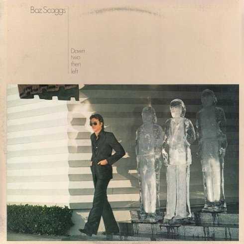Allmusic album Review : With 1974s Slow Dancer, produced by Johnny Bristol, Scaggs recast himself as a more R&B-infused; singer. 1976s multi-million-selling Silk Degrees found Scaggs switch paying off commercially, displaying enough skills and chops that the odious "blue-eyed soul" tag was deemed passé. This is noticeably more detached than Silk Degrees. And although this set is indeed quirky, the often unsurprising production featuring almost-on-cue guitar solos makes this album more "mainstream" than it had to be. "Still Falling for You" kicks the album off and sets the standard for the skilled, seamless production juxtaposed to meandering, almost incoherent lyrics. The melodic "A Clue," the best of the released singles, attains the offhanded cool and tunefulness that most of this set is striving for. Although this set is more soulful throughout than Silk Degrees, nothing sticks out like "What Can I Say." More than anything, this album puts the spotlight on Scaggs romantic views, but they are so all over the road its hard to tell what he really thinks. On the lush "Were Waiting," a listener may not have an idea of what hes talking about, but his vocal inflections say what the lyrics fail to. After a while, Scaggs seems to give up on making this a statement about love and offers some so-so rockers. In particular, the strongly produced "1993" has Scaggs imagining a drastically changed world as he sings, "Before they take me up/Theyll have to alter, alter me." Down Two Then Left has a melancholy appeal much like Al Green Is Love and Joni Mitchells Hissing of Summer Lawns, but a few concessions prevent this from being in their elite class. down_two_then_left