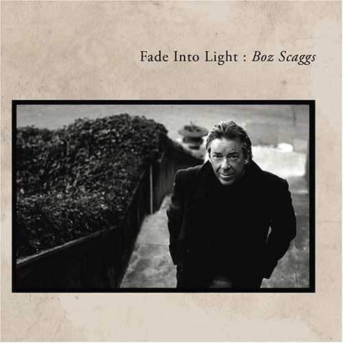 Allmusic album Review : Fade into Light is a stellar album. It features unplugged and redone performances from Scaggs classic Some Change, Silk Degrees, and Middle Man, as well as some new tunes. The unplugged tunes include readings of "Dirty Lowdown" and "Simone." "Harbor Lights" is changed significantly as well, in that the disco riff in its ending has been replaced by smooth jazz. "Sierra" is a remarkable redo that gives the tune a completely different feel. "Just Go" has Scaggs playing almost everything on the track, and it is one of his most nakedly emotional performances committed to tape. The sheer brokenness in his voice reveals a depth and dimension in the performance that takes the listener deep into the lyric. It is followed by a sultry, nocturnal read of "Love T.K.O." that reveals his deep authority, allowing the lyric to speak through him, not because of him. There is an authority here that allows the vast emotion in the song to be read through the spirit of acceptance, and it all lies in his nuance and phrasing. Its so inspired, offering a view of the many sides of Scaggs as a singer, that Fade into Light is a must for anyone even remotely interested in Boz Scaggs. fade_into_light