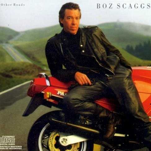 Allmusic album Review : When Boz Scaggs released Other Roads in 1988, hed been off the scene for a full eight years. Produced by Bill Schnee, it featured some of his most unlikely songwriting collaborations with instrumental backing by Toto along with some studio aces. Scaggs tried hard to walk a line between the decades obsession with more processed studio sounds that utilized electronic keyboards and drum machines up front, while relying more heavily on electric guitars and kit drums. He doesnt always succeed in keeping the balance, but the attempt sets him apart from most mainstream acts at the time. Other Roads is odd from the start: the opener, "Whats Number One?" is a spacey pop number written with the late poet and songwriter Jim Carroll and bassist/arranger Marcus Miller. "Right Out of My Head," written with Dan and David Huff, juxtaposes Steve Lukathers blistering guitar work against a synth fill right out of Gary Numans "Cars." Scaggs nailed another number one with "Heart of Mine" co-written with pop-jazz songwriter Bobby Caldwell (and the only cut produced by Stuart Levine). Theres a strange futurist club noir inherent in both "I Dont Hear You" and "Crimes of Passion" written by Carroll and the Huffs. "Cool Running" written by Scaggs with Patrick Leonard is a solid, grown up, island groover with staggered R&B; horns contrasted with a female backing chorus and a bridge of vocal counterpoint. "Claudia," by Steve Williams is one of Scaggs classic mid-tempo, broken love songs with a killer bridge, and stellar guitar work by Lukather. The set closer is a dreamy adult pop ballad entitled "The Night of Van Gogh," co-authored by him, Caldwell and Peter Wolf. Scaggs was in top vocal shape when he cut this: cool, bemused, but able to capture and communicate emotion mellifluously with freeze frame accuracy. While Other Roads didnt scale the charts as an album, and is regarded as a minor work, hearing it in the 21st century reveals Scaggs ambition and vision reach outside the box in a collection of great songs -- even if the production doesnt fare as well as the material. other_roads