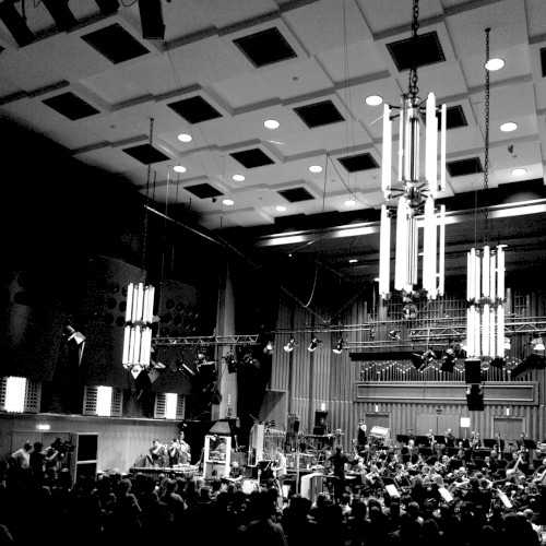 Allmusic album Review : As the healthy number of live albums in the bands discography attests, Calexico are always a solidly entertaining live act and no stranger to documenting their performances. Still, Spiritoso is special enough that the group made it a Record Store Day exclusive for its original release. Documenting German performances with the Radio Symphonieorchester Wien and Deutsches Filmorchester Babelsberg, the album boasts a well-chosen set list drawing from Algiers, their most recent album at the time, as well as 1998s The Black Light, 2003s Feast of Wire, and 2008s Carried to Dust (they even perform "Crystal Frontier," a hard-to-find track first issued on the European version of their underappreciated third album, The Hot Rail). Hearing Calexico perform songs from a large portion of their career allows their strengths to come to the fore, and Spiritosos highlights make the most of the drama that their music has had since the beginning. Beginning with the fan-favorite medley of The Black Lights "Frontera/Trigger," the albums orchestral treatments make the most of Calexicos spaghetti Western majesty and whispery noir undercurrents. "Black Heart," which has the kind of stylishly world-weary melody made for strings and brass, is another standout, along with the other Feast of Wire cuts "Minas de Cobre" and "Quattro." The orchestral arrangements arent as integral to "Epic," where the insistent acoustic guitars take center stage, or "Two Silver Trees," where the strings add a little more depth. Even if Spiritoso isnt quite the definitive live Calexico statement, its still an elegant album that should please fans who enjoy the bands concert documents. spiritoso