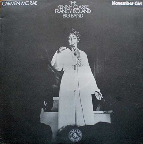 Allmusic album Review : The Kenny Clarke-Francy Boland Big Band didnt record too often with vocalists, so this meeting with Carmen McRae had a lot of potential. McRae was likely seeing most of these songs for the first take at the recording sessions, since almost all are originals written by the bandmembers. Shes game and does her best, but several tracks are badly dated by Bolands insistence upon using an inferior electric piano, whereas no piano at all on these performances would have sounded far better. McRaes voice is also subjected to excessive reverb in "November Girl," taking something away from what is otherwise a fine effort. The band is in great form, with a number of strong solos (though none are credited) and excellent section work. Among the all-star bands members are trumpeters Art Farmer, Benny Bailey, and Idrees Sulieman and saxophonists Billy Mitchell, Sahib Shihab (who doubles on flute), and Tony Coe, along with Boland and drummer Kenny Clarke. Dizzy Gillespie is a surprise guest, playing snare drums on one track. This is a good session that could have been far better without the cheesy electronics. november_girl