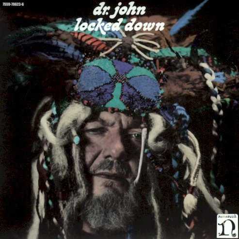 Allmusic album Review : Between 1968 and 1972, New Orleans-cum-L.A. session musician Mac Rebennack transformed himself into Dr. John, The Nite Tripper. He recorded a series of albums for Atlantic, most importantly Gris-Gris, but also Babylon, Remedies, and The Sun, Moon, & Herbs; they seamlessly wove a heady, swampy brew of voodoo ritual, funk, and R&B, psychedelic rock, and Creole roots music. The Black Keys guitarist Dan Auerbach admitted upon meeting Rebennack that he wanted to produce a Dr. John album and to revisit the Nite Trippers musical terrain on record. The pair worked in Auerbachs Nashville studio with a group of younger players to explore the rawer, spookier elements in Dr. Johns music. Locked Down is not an attempt to re-create Gris-Gris, which remains his classic; it -- and the other three records -- resembled nothing that existed before. Auerbach and Dr. John wanted to make a modern recording that drew on the spontaneous, more organic feel of those records; they succeeded in spades. Locked Down isnt quite swampy, but it is humid, even steamy. Its grooves are tight but raw and immediate. Its lyrics and music are charged with spiritual energy, carnal desire, and righteous indignation. It melds primal rock, careening R&B, and electric blues in an irresistible, downright nasty brew. The fingerpopping horn chart that announces "Revolution," is underscored by a fat baritone sax, an urgent, shake-your-ass bassline, and pulsing guitars. Drum breaks are constant in accompanying Rebennacks screed against corruption, "religious" hatred, and violence, which degrade humanity. His Wurlitzer solo is brief yet searing. "Ice Age"s guitar, drum, and percussion vamp are deadly infectious. Rebennacks voice growls about collusion between the CIA and KKK and the end of an era, as the McCrary Sisters complement the vocals with an R&B chorus line in affirmation. His organ drones and wheezes to complete the picture, yet turns the last line into possibility: "If you aint iced/you got the breath of life within."The electric piano on "Getaway" sets up a funktastic, bluesed-out swing. The guitars and Nick Movshons hyper bassline drive it urgently with clusters of surf-like chords, reverb, and effects, completed by a roiling, over-the rails Auerbach solo. "Eleggua" is pure spaced-out Nite Tripper, a cosmic funky butt strut; its chanted mystical prayers come from the world of flesh and spirit; its populated by slippery, watery guitars, wailing B-3, broken snare beats, and even a flute. That feel is underscored in the nocturnal shift and shimmer of "My Children, My Angels," driven by Rebennacks Rhodes, guitars, and a skittering snare. Its greasy yet somehow in synch with this love letter from a repentant father to his kids. Rebennack and Auerbach send it off, appropriately enough, with rock & roll gospel in "Gods Sure Good" and a joyous chorus from the McCrarys behind-the-lyrics gratitude, highlighted by a swelling B-3 and backbone-slipping grit. No matter which era or what record you prefer, as an album, Locked Down stands with Rebennacks best. locked_down