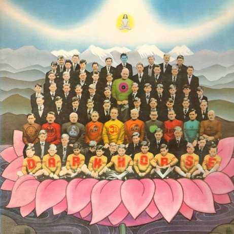 Allmusic album Review : With his first solo tour looming ahead in November and December of 1974, George Harrison felt impelled to rush out a new album, and even a steadily worsening case of laryngitis wouldnt stop him. Would that it did, for the appallingly weak state of his voice would torpedo this album and the tour, to his great embarrassment. "Haris on Tour (Express)" -- with Tom Scotts L.A. Express churning out all-pro L.A.-studio jazz/rock -- gets the doomed project off to a spirited start, but its an instrumental, and Harrisons vocal distress becomes obvious to all in the next track, "Simply Shady." Some of Georges tunes -- particularly the title track and the exquisite "Far East Man" -- might have benefited from waiting for a better time to record, while others probably could not have been saved. The recording quality, like the voice, has a raw, coarse-grained sound that belies the impeccable musicianship. Dark Horse is perhaps most notorious for Harrisons bitter, slipshod rewrite of the Everly Brothers hit "Bye Bye Love" -- referring openly to Georges wife Pattie running off with Eric Clapton and, for good measure, having both of them on the session! Dark Horse would also be the name of Harrisons soon-to-be-formed new label, as well as a metaphor for the underestimated Beatle who leaped artistically and commercially ahead of his three colleagues immediately after the Beatles breakup. Unfortunately, this album -- despite its humorous Sgt. Pepper parody on the cover and outright plea to critics on the margins of the inside jacket to go easy on its contents -- would only undermine Harrisons hard-fought campaign for respect. dark_horse