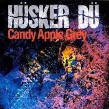 Allmusic album Review : Moving to a major label doesnt affect Hüsker Düs sound greatly -- although the production is more full-bodied than Spots razor-thin work, the Hüskers dont change their blazing attack at all. Much of Candy Apple Grey charges along on the same frenzied beat that propelled New Day Rising and Flip Your Wig, and both Bob Mould and Grant Hart are in fine form, spinning out fine punk-pop with "Sorry Somehow" and "Dont Want to Know If You Are Lonely." However, the sound is beginning to seem a bit tired, which is what makes Moulds two acoustic numbers, "Too Far Down" and "Hardly Getting Over It," so welcome. Demonstrating that punks can mature without losing their edge, Mould inverts the rules of conventional confessional singer/songwriter songs with these two haunting numbers, and in doing so, he illustrates the faults with the relatively staid post-hardcore punk that dominates the remainder of the record. candy_apple_grey