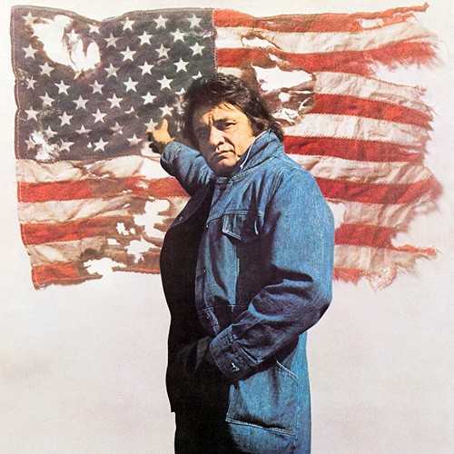 Allmusic album Review : Its a little hard to recover from the over-the-top patriotism of the opening title cut on this mid-70s release, with its overbearing spoken narrative and shamelessly melodramatic orchestral production. Actually, however, that song is not typical of this release, which otherwise finds Cash backed only by the Tennessee Three (Carl Perkins, Larry McCoy, and Ray Edenton), with the Oak Ridge Boys singing backup on a couple of tracks. "Dont Go Near the Water" is, in contrast to the title song, rather radical for a country singer in its ecological protest with its chorus of "Dont go near the water children/See the fish all dead upon the shore/Dont go near the water/Cause the water isnt water anymore." The rest of the album is agreeable low-key Cash country, though with something of a more-of-the-same feeling that makes it a middle-of-the-road Cash release at best; "All I Do Is Drive" sounds like a hybrid of old Sun singles like "Cry, Cry, Cry" and "Big River," for instance. The songs go over familiar Cash territory like drifting, loneliness, and the struggle to keep your head above water. But none of them rate among his best, though "Please Dont Let Me Out" puts a twist on his prison stories by taking the viewpoint of a prisoner who wants to stay put as he now considers jail his home. ragged_old_flag