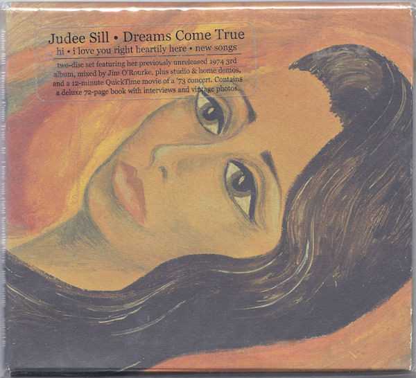 Allmusic album Review : When singer/songwriter Judee Sill died at the age of 35, she had issued two albums under her own name on David Geffens Asylum label in 1971 and 1973, respectively. (Both have since been re-released with bonus material by Rhinos web-only Handmade imprint.) She had another one more or less in the can, recorded in 1974, but it was never finished or released. Her brand of folk music was enigmatic, full of light breeziness, nicely orchestrated (she wrote the charts herself), and drenched in a natural world mysticism that was more ethereal than the standard California fare of the early 70s. Dreams Come True is that lost third album, produced by Bill Plummer and track engineered by Emitt Rhodes, with the finished mix done by Jim ORourke in 2004, 30 years after the album was shelved. Water Records, quickly becoming the obscurantists reissue label, has put together a lavishly presented package that houses Dreams Come True, bonus tracks in the form of demos and rehearsals, and a second disc entitled "Lost Songs," recorded by Tommy Peltier in his home studio and in his living room, which includes nine unreleased tracks and a 12-minute QuickTime movie of Sill performing in concert. The musical -- and production -- quality on Dreams Come True is high, given that it was recorded in a professional studio. Sill had been fully in possession of her muse when making it. Sill and Art Johnson did the musical charts, and she and Marc McLure arranged the vocals. Those familiar with her first two offerings will find this to be deeper in the vein, fleshed out, more focused. Sill could write hooks as well as she could write words, and these tracks, particularly "Thats the Spirit," "The Living End," and "Til Dreams Come True," are moving emotionally, while not being at all mopey. They are jaunty and full of a sun-drenched airiness that stood out, even when the subject matter -- as spiritual as much of it was -- was melancholy. Sill never beat a lyric of a tune over the head. Disc two is, naturally, much rougher. This is for the fans, the hardcore devotees who feel there was never enough out there. Some of these tunes have appeared in various guises on the Internet, but these versions are cleaner, though there are almost no credits for the other musicians on the sessions. "Dead Time Bummer Blues" is a fully realized outing, while "Sunny Side Up Luck" is barely a sketch. The stunner on the set is the acoustic home recording of "Emerald River Dance." Its starkness and unpolished beauty are intoxicating, and give the listener a true portrait of the artist in an intimate environment. The package is lavish -- the CDs are in an envelope-folded slipcase and the 72-page book contains interviews with the artist, friends, family, and acquaintances, offering a deeply troubling and even heartbreaking slice of biography that underscores just how remarkable Sills music was in lieu of her life circumstances. This is a treasure. dreams_come_true