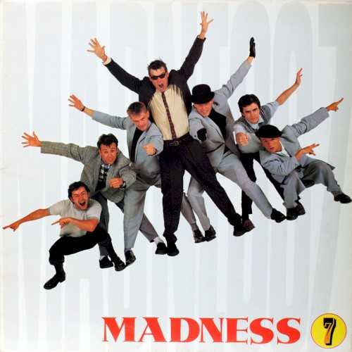 Allmusic album Review : The third album is often where a band makes a great leap forward, and so it is with Madness’ Seven. Although they’re still clearly the same nutty band that tore it up with One Step Beyond, Seven finds the group expanding its horizons considerably, ratcheting up the melodious pop quotient in their songwriting, as well as the distinctly English character sketches. Much of the album comes across as a blend of the Kinks and Ian Dury backed by a propulsive ska beat, and the production is a appropriately just as imaginative, colored by the odd sitar, finding new carnivalesque flourishes for the horns, and expanding the rhythmic palette considerably. Sometimes, the group still gets ridiculously silly -- “Benny Bullfrog” is a novelty by any other name -- but the genius of Madness is that they would toss off these frivolous numbers as easily as they would throw out something as elegiac as “Grey Day,” while finding the sweet spot between those two extremes on singles like “Cardiac Arrest.” Not every band possesses such a light touch, and while they certainly got more refined just an album later with The Rise & Fall, Seven is where they revealed the full potential of their talents. 7