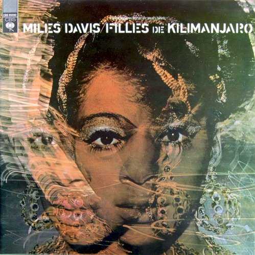 Allmusic album Review : Since its billed as "Directions in Music by Miles Davis," it should come as little surprise that Filles de Kilimanjaro is the beginning of a new phase for Miles, the place that he begins to dive headfirst into jazz-rock fusion. It also happens to be the swan song for his second classic quintet, arguably the finest collective of musicians he ever worked with, and what makes this album so fascinating is that its possible to hear the breaking point -- though his quintet all followed him into fusion (three of his supporting players were on In a Silent Way), its possible to hear them all break with the conventional notions of what constituted even adventurous jazz, turning into something new. According to Miles, the change in "direction" was as much inspired by a desire to return to something earthy and bluesy as it was to find new musical territory, and Filles de Kilimanjaro bears him out. Though the album sports inexplicable, rather ridiculous French song titles, this is music that is unpretentiously adventurous, grounded in driving, mildly funky rhythms and bluesy growls from Miles, graced with weird, colorful flourishes from the band. Where Miles in the Sky meandered a bit, this is considerably more focused, even on the three songs that run over ten minutes, yet it still feels transitional. Not tentative (which In the Sky was), but certainly the music that would spring full bloom on In a Silent Way was still in the gestation phase, and despite the rock-blues-n-funk touches here, the music doesnt fly and search the way that Nefertiti did. But thats not a bad thing -- this middle ground between the adventurous bop of the mid-60s and the fusion of the late 60s is rewarding in its own right, since its possible to hear great musicians find the foundation of a new form. For that alone, Filles de Kilimanjaro is necessary listening.