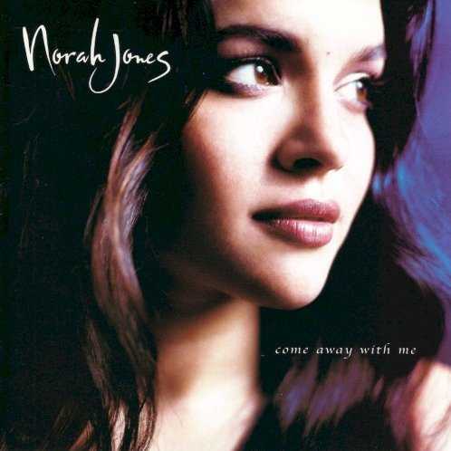 Allmusic album Review : Norah Jones debut on Blue Note is a mellow, acoustic pop affair with soul and country overtones, immaculately produced by the great Arif Mardin. (Its pretty much an open secret that the 22-year-old vocalist and pianist is the daughter of Ravi Shankar.) Jones is not quite a jazz singer, but she is joined by some highly regarded jazz talent: guitarists Adam Levy, Adam Rogers, Tony Scherr, Bill Frisell, and Kevin Breit; drummers Brian Blade, Dan Rieser, and Kenny Wollesen; organist Sam Yahel; accordionist Rob Burger; and violinist Jenny Scheinman. Her regular guitarist and bassist, Jesse Harris and Lee Alexander, respectively, play on every track and also serve as the chief songwriters. Both have a gift for melody, simple yet elegant progressions, and evocative lyrics. (Harris made an intriguing guest appearance on Seamus Blakes Stranger Things Have Happened.) Jones, for her part, wrote the title track and the pretty but slightly restless "Nightingale." She also includes convincing readings of Hank Williams "Cold Cold Heart," J.D. Loudermilks "Turn Me On," and Hoagy Carmichaels "The Nearness of You." Theres a touch of Rickie Lee Jones in Jones voice, a touch of Bonnie Raitt in the arrangements; her youth and her piano skills could lead one to call her an Alicia Keys for grown-ups. While the mood of this record stagnates after a few songs, it does give a strong indication of Jones alluring talents. come_away_with_me