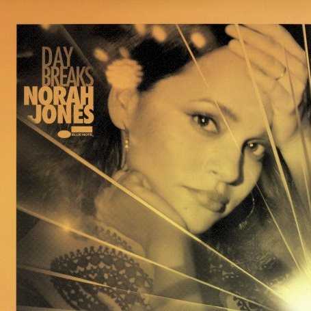 Allmusic album Review : Norah Jones took liberty with her blockbuster success to set out on a musical walkabout, spending a good portion of the decade following 2004s Feels Like Home experimenting, either on her own albums or on a variety of collaborations. Day Breaks, released four years after the atmospheric adult alternative pop of the Danger Mouse-produced Little Broken Hearts, finds Jones returning home to an extent: it, like her 2002 debut Come Away with Me, is a singer/songwriter album with roots in pop and jazz, divided between originals and sharply selected covers. Such similarities are immediately apparent, but Day Breaks is much slyer than a mere revival. That term suggests a slight air of desperation, but Jones comes from a place of confidence on Day Breaks, happy to demonstrate everything shes learned over the years. Often, these tricks are deliberately sly: shell pair her torchy original "And Then There Was You" with a woozy, bluesy cover of Neil Youngs "Dont Be Denied" that winds up evoking Come Away with Me, then follow that up with the dense, nocturnal rhythms of "Day Breaks." She threads in versions of Horace Silvers "Peace" and Duke Ellingtons "African Flower" while inviting saxophonist Wayne Shorter and organist Lonnie Smith in to play -- moves that signal that theres a strong, elastic jazz undercurrent to Day Breaks that means this record breathes more than her debut. Such a sense of quiet adventure gives the record depth, but what gives it resonance are the exquisitely sculpted songs. Jones originals feel as elegant as time-honored standards, and all her covers feel fresh. The former speak to her craft, the latter to her gifts as a stylist, and the two combine to turn Day Breaks into a satisfying testament to her ever-evolving musicianship. day_breaks