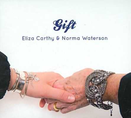 Allmusic album Review : British folk giants Eliza Carthy and Norma Waterson have collaborated on numerous projects over the years, but Gift marks the first time that the mother and daughter have released a collection of songs as an official duo. Backed by the usual assortment of English folk dynasty members like Martin Carthy, Danny Thompson, Aiden Curran, Martin Simpson and various other Watersons, Gift offers up the usual amalgamation of traditional songs, all of which are driven through the snow by Carthy and Waterson’s rich, commanding voices. Opening with a rousing rendition of Appalachian spiritual “Wayfaring Stranger” and closing with the gorgeous, seafaring ballad “Shallow Brown,” Gift is an effortless compendium of ancestral music, crafted by two of its greatest champions, that more than lives up to its name. gift
