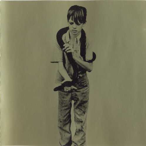 Allmusic album Review : If at first you dont succeed, try again. Riot City Blues is another attempt at straight-up trad rock where the ghosts of the Faces, the Rolling Stones, and others come traipsing into Bobby Gillespies scope and he goes for it. Some heard an overly strenuous attempt at this on 1994s Give Out But Dont Give Up, where it worked not at all due to the bands attempt at literally mimicking the sounds of the aforementioned bands without adding anything else to the mix. Riot City Blues is a much more relaxed effort, and benefits significantly from that stance. Yeah, its true that on first listen "Country Girl," the albums opener, sounds like an in-the-studio gathering of the Stones and the Faces riotously attempting a country gospel song -- but on deeper observation, it feels more like Delaney & Bonnie & Friends on Motel Shot. The straight-up raw boogie rock of "Nitty Gritty" takes the Delaney & Bonnie move even deeper and brings elements of R&B into the equation. This is late-night drunken rockism. Its not carefully crafted; its throwing something at the wall because its there to throw. Riot City Blues is not an "album as event" as many past Primal Scream records were; this is an "album for its own sake" recording. Its an offering where it really seems that Gillespie doesnt care if he loses his hipster following -- all that matters is that Riot City Blues rocks.<br><br> One can hear traces of not only the Faces but everything from early Alice Cooper (à la Killer) to Mott the Hoople, David Bowie, the Kinks, the New York Dolls, and a whole lot of other rock & roll bands. Looser than the Black Crowes, thinner than even the Black Keys; its simply shambolic from top to bottom. This is trashy, nasty rock music that doesnt feel modern but it does feel timeless. The songs are riff-centric, some of them joyous, others darkly freaky -- "When the Bomb Drops" is a fine example, and the complete dope and guitar orgy of "Suicide Sally & Johnny Guitar" is in the red zone in the same way "Suffragette City" is. (One can feel the gigantic pub-crawling smile of Mick Ronson from some strange Valhalla.) Most of the tracks here were produced by ex-Killing Joke bassist/Orb collaborator Youth, with a pair recorded and produced by the rather less intense Andrew Innes. Whether "Were Gonna Boogie," with its bluesy harmonica and slide guitar -- with Bobby Gillespie sounding like Donovan singing the Stones "Country Honk" -- is taking the piss or not is debatable, but its a gas to listen to, as is the down-home "Hells Comin Down," with its fiddle (courtesy of the Dirty Three and Bad Seeds Warren Ellis), high-strung guitars, 12-strings, and mandolins. The 12-bar blues formula used on the latter cut is particularly refreshing. "Dolls" is such a raucous joy that its infectious. Its a given that Riot City Blues, issued in 2006, is easily the most unhip record Primal Scream have ever issued. The songs are little more than dressing for the riffs, but they have lots of humor and cleverness and they lack the snide hipsterism of the times. It doesnt matter. Listened to with an open mind, its a refreshingly retro rock & roll album that uses its waste-oid imagination in capturing every fantasy that entered Bobby Gillespies teenage mind. Get it. [The U.S. edition of the album includes three bonus tracks (including a cover of John Lennons "Gimme Some Truth") and the "non censored" version of the "Country Girl" video.]