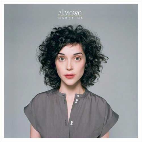 Allmusic album Review : With experience playing with the Polyphonic Spree, Sufjan Stevens, and Glenn Branca, Annie Clark is more than qualified enough to start writing her own loosely ornate, lush pop songs. But while Clark, who chooses to use the name St. Vincent here, does incorporate the frilly strings and horns, background choirs, and various keyboards (most of which she plays) of her past employers in Marry Me, her solo debut, she also has an edge to her -- something that shows up in the distorted electric guitar solos of "Jesus Saves, I Spend" or "Now, Now," the drums in the ominous "The Apocalypse Song" or "Your Lips Are Red," the growing intensity of the vocals "Landmines," the funereal waltz of the fantastic "Paris Is Burning" ("I write to give the war is over/Send my cinders home to mother," Clark sings sadly over electronic drumbeats and acoustic guitars) -- that pushes her away from the overly sentimental and quaint. Not that Marry Me doesnt have its fair share of happy love songs ("All My Stars Aligned," "What Me Worry?"), but the album isnt seeped in that kind of joyfulness that sings blind and insincere. Its an mix of good and bad, of light and dark, of the woman who purposefully sets up the obstacles she must get through to find her lover ("Im crawling through landmines/I know cause I planted them," she sings disarmingly), of sweet self-deprecation ("Marry me, John, Ill be so good to you/You wont realize Im gone"), honest and quirky and totally enticing. Clark is young enough that shes still able to retain that sense of wonder about the world without seeming naïve, and old enough that she can say things like "My hands are red from sealing your red lips" and you believe her. Its an orchestral record for those who prefer the simplistic, a darker one for those who prefer theirs twee, love songs for the scorned and sad songs for the content, an engaging and alluring combination that makes Marry Me nearly irresistible, and one of the better indie pop albums thats come around for a long time. marry_me