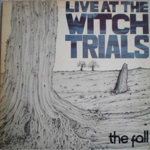 Allmusic album Review : That the first Fall album in a near endless stream would not only not sound very punk at all but would be a downright pleasant listen (thanks to Yvonne Pawletts electric piano on "Frightened") seems perfectly in keeping with Mark E. Smiths endlessly contrary mind. His inimitable drawl/moan and general vision of the universe (idiots are everywhere and idiotic things are rampant) similarly sprawl all over the music -- theres no question who this is or whose band it is, either. That said, most of Live at the Witch Trials is co-written with Martin Bramah, whose guitar work here is noticeably much more inclined to chime and ring instead of brutally scratch away like Craig Scanlons awesome work would soon do. Bramahs not just here to sound tuneful, though, and the killer Marc Riley/Karl Burns rhythm section both keeps up the energy and provides surprising grooves. On chugging tracks like "Two Steps Back," its not hard to tell that Smiths Krautrock fandom is coming into play. With Pawletts keyboards providing a pretty garage kick on top of it all, the result is an all-around treat. Brilliantly scabrous tracks are everywhere, one of the most memorable being "Rebellious Jukebox," simultaneously one of the most tuneful and aggressive songs from the early lineup, Smith pouring it on along with the band. The driving funk of "Music Scene," meanwhile, redefines misanthropy (and more) with a particularly central Smith target in mind. "No Xmas for John Quays," meanwhile, almost establishes the Fall formula on its own: Smith chanting and yelling over a quick, semi-rockabilly shamble and attack punctuated by unexpected stops and starts. live_at_the_witch_trials