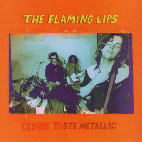 Allmusic album Review : The same extraordinary madness that infected the best work of Brian Wilson rears its head on the shimmering and melodic Clouds Taste Metallic, a masterful collection which completes the Flaming Lips odyssey into the pop stratosphere. The Pet Sounds comparisons are obvious -- two of the highlights are titled "This Here Giraffe" and "Christmas at the Zoo" -- yet not unfair; like Brian Wilson, Wayne Coyne has refined his unique vision into something both highly personal and powerfully universal. Similarly, while Coynes lyrics remain as acid-damaged and inscrutable as ever, his densely constructed songs convey emotional complexities far beyond the scope of their head-case titles ("Psychiatric Explorations of the Fetus With Needles," "Guy Who Got a Headache and Accidentally Saves the World"); galvanized by equal parts newfound maturity and childlike wonderment, Clouds Taste Metallic is both the Flaming Lips most intricate and most irresistible work. clouds_taste_metallic