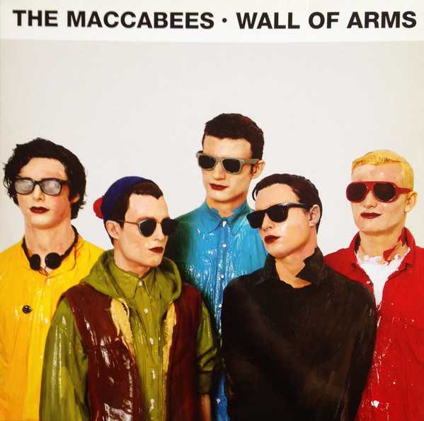 Allmusic album Review : Maccabees first album, Colour It In, was more than a little indebted to the Futureheads, Bloc Party, and the other U.K. acts who popularized urgent tempos and angular riffs in the mid-2000s, but the band drastically renovates their sound on Wall of Arms. However, its still easy to hear where they get their inspiration. Theyve traded their formerly scrappy approach for a style that borrows the Arcade Fires anthemic sweep -- its no coincidence this album was produced by Arcade Fire collaborator Markus Dravs. On "Can You Give It," singer Orlando Weeks previously marble-mouthed vocals have morphed into something closely resembling Win Butlers tremulous keen, and the rest of the song follows suit, with galloping drums and handclaps that lead the way to massive choruses with a dramatic ebb and flow. Even though the band shows its influences just as transparently as they did on Colour It In, they sound much more confident and comfortable -- in fact, they seem downright eager to display their newfound skills and polish: the brass on "Young Lions" and throughout the album underscores the majestic levels that Maccabees try to reach. Wall of Arms is bookended by "Love You Better" and "Bag of Bones," both of which are far slower and more patient about showing off their goods than any of Maccabees earlier work; likewise, the band would have been too hyperactive to attempt "Seventeen Hands" thoughtful-yet-jubilant reflections on love and marriage on Colour It In. However, they havent totally abandoned their pop instincts. "One Hand Holding" and "Dinosaurs" boast sing and shout-along choruses, and "Kiss and Resolve" plays like a more grown-up take on their bouncy insistency. Crucially, despite the more sedate tempos and outlook, these songs feel truly purposeful. And even if Maccabees still arent stunningly original, theyve made a significant step forward with Wall of Arms. wall_of_arms