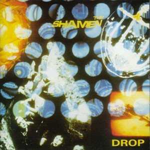 Allmusic album Review : Ecstasy had a shocking effect on the Shamen, widening the gulf between Drops dour psychedelic rock and the later politicized drug-rave apologia in singles like "Move Any Mountain" and "Ebeneezer Goode," but many believed the band leapt across the divide too soon. 1987s "I Dont Like," "Young Till Yesterday," and "World Theatre" were products of a band busy with the rattled monotone of the Chameleons, or the Cure at their "Killing an Arab" best, and linchpin Colin Angus always found a way to work through the textures of acid rock without sacrificing melody. Elsewhere, the band incorporated synthesizers in a style that never felt unnatural or simply an excuse to play smoke and mirrors to a late-80s audience bored of indie guitar music. All of which helped the Shamen take off to bigger and brighter things, of course, but one must wonder if the group would ever have had the same impact if they didnt begin their career with such vaporous unconventionality. drop