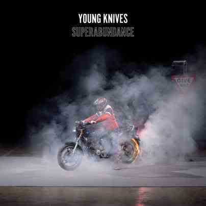 Allmusic album Review : Young Knives couldnt be faulted for much on their breakthrough album, Voices of Animals and Men. If their tartar plaid and throwback video-making -- not to mention their angular new wave musical sense -- made them seem rather retro-obsessed, their songs were pure gold and singer Henry Dartnall played the nerdy, over-analytical type very well. But where Voices of Animals and Men featured social critique that didnt make life seem too bad (just the kind of place where you might have to work in a takeaway shop or get a little freaked out about relationships and school life), on Superabundance the situation is quite dire. Dartnalls view of life in England now includes the dreariness of its domestic life, its materialism, the desperation of its nightlife, its lack of care for the individual -- and thats just the first four songs. Its gotten so bad, apparently, that suicide is an option ("Sitting in the front seat/turning on the motor/sucking on the hosepipe/keep it turning over"). But music is, by and large, entertainment and escapism, so regardless of whether Young Knives intend to add enlightenment to that formula, their hooks and their ideas -- their entire musical package -- are too intriguing and exciting to provoke the usual worries about agit-pop. (Tiresome themes, depressing lyrics, and worse yet, the listeners nagging sense that all this has been heard before.) The trio definitely have mastered the basics of new wave: the spiky rhythms, plunging basslines, jagged guitars, and yelping vocals. More so than their debut, however, theyre proving themselves masters of arranging and pacing their songs for maximum impact, letting guitars rage only up to a point and switching gears multiple times even before they hit the bridge. If youre afraid theres too much faux-populism on display (and not enough true populism), listen to the sober epic "Turn Tail" for something that reaches farther in a lyrical sense than most any other British band of the 2000s; the fatalism of the chorus ("Were all slaves on this ship/this ships sinking") turns to hope near the end ("Swim to the coast, boat full of ghosts, jump from the prow"). Like certain of their forebears (Gang of Four being only the most obvious), Young Knives understand that using music to make social statements means very little unless the music is as strong as the statements. superabundance