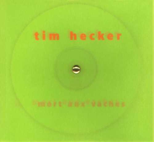 Allmusic album Review : Tim Hecker fans, beware: his contribution to Staaplaats Mort aux Vaches series is significantly quieter than his previous opuses. That being said, it is also one of his sleekest releases. His live set for the Dutch national radio VPRO consists of a continuous 41-minute piece. Early on, he strikes a delightful balance between tone and texture, pairing quiet electrical noise with a delicate string chord (lifted from some Mahler, perhaps?). That figure will become the leitmotif of the piece: individual tones or chords barely surfacing from a quiet storm of noise. Grace and seduction soak the piece, along with a sense of well-being in a society where interference has become the main ground rule. Voices are occasionally heard, their discourse no more than a murmur, their tone just another surfacing note. The piece evolves very slowly during the first 20 minutes, delicately shifting between textural layers. At the 20-minute mark the piece collapses inward and falls nearly silent. The second half is characterized by a quiet noise foundation spiced up by musical events -- a proto-melody here, a pretty music box-like development there, a quick surge in volume to introduce a new element that will gradually disappear the moment you detect its presence. The whole piece carries the listener like a daydream, careful not to jolt him/her out of his/her reverie, yet skillful enough to feed the dream through its whole duration. As is the case with all Mort aux Vaches releases, this album is in a limited edition of 1,000 copies. mort_aux_vaches