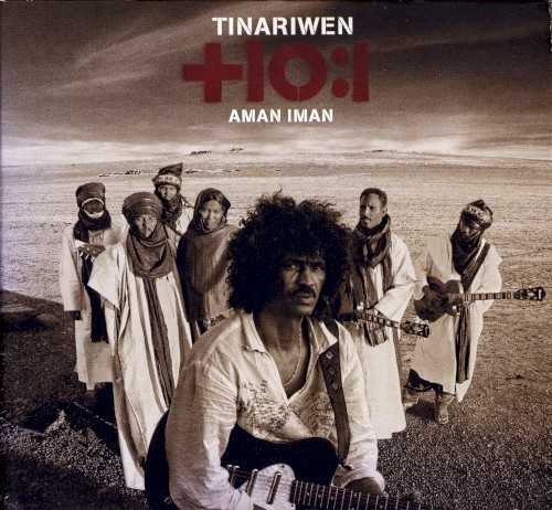 Allmusic album Review : Hand it to Tinariwen. Like the nomads they are, they dont stand still musically. On their third album (the title translates as Water Is Life), they keep the root intact, the desert blues still at the heart of all they do, but this builds upon what they achieved on their superb sophomore disc, happily restless and unafraid of walking down new paths. However, although theyre rightly lauded for their widescreen blues sound, what emerges most here is something they hinted at on the last record -- theyre a remarkable rock & roll band, too. The guitars, locked together in rhythm and lead, create a glorious syncopated noise that puts most rockers to shame. But theres a wonderful looseness to the sound (kudos to producer Justin Adams), in part due to the fact that these tracks were all recorded over just two weeks, a tiny time frame by todays standards. Recorded in the Malian capital of Bamako, these songs arrive with dust on their boots and a little thirsty. The studio touches are subtle, a little on the effects here and there, but never detract from the music -- which even features old member Mohammed Ag Itlale, whose voice and guitar can be heard on several tracks. aman_iman_water_is_life