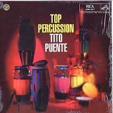 Allmusic album Review : A stunner from Puentes golden age, this 1957 recording brought together Tito, Mongo, Willie Bobo, Aguabella, and Julito Collazo on percussion with vocalists that included Mercedita Valdez, in seven wonderful cuts of traditional and (then) contemporary Afro-Cuban skin-on-skin. Then as an unexpected gift, there is a seven-minute Latin-jazz suite featuring Puentes considerable jazz-arranger head and a powerful band with Doc Severinson on lead trumpet. top_percussion